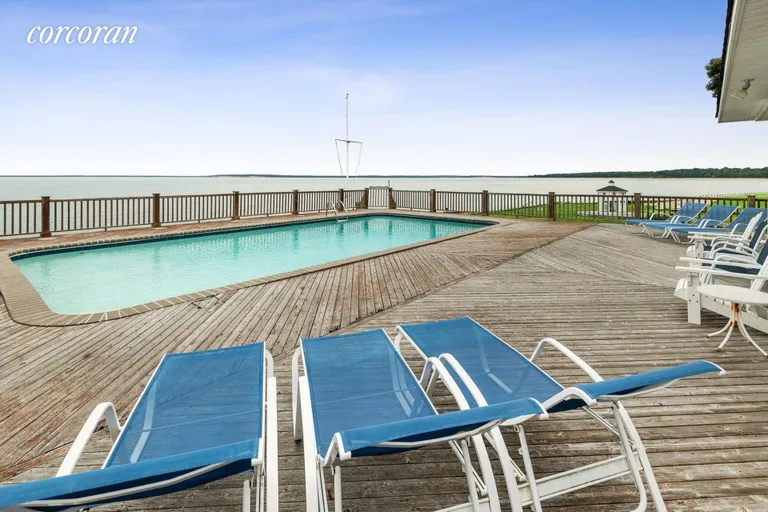 New York City Real Estate | View 10B Club Dr | Water front pool with decking | View 20