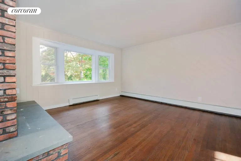 New York City Real Estate | View  | Living Room with wood burning fireplace | View 2