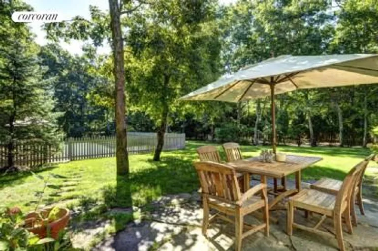 New York City Real Estate | View  | Blue slate patio with view to back yard and fenced in pool area | View 19