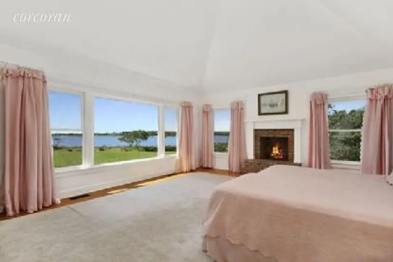 New York City Real Estate | View 24 Chauncey Close | Master Bedroom with Pond/Ocean View | View 8