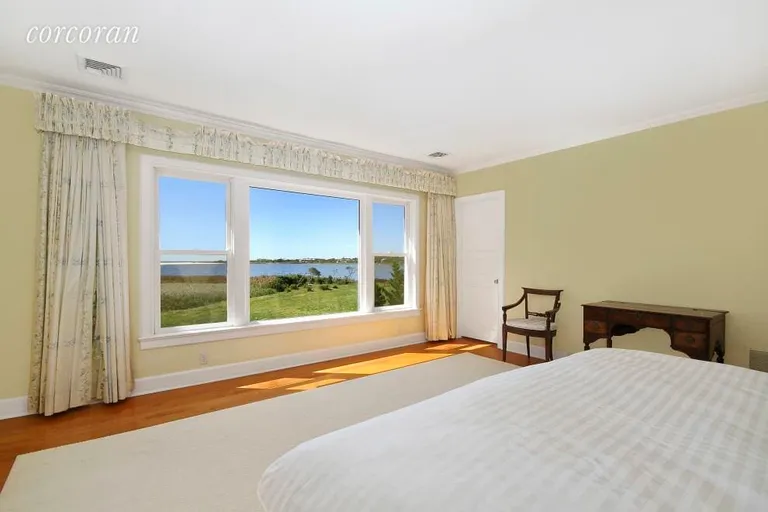 New York City Real Estate | View 24 Chauncey Close | Guest Bedroom with Pond/Ocean Views | View 9
