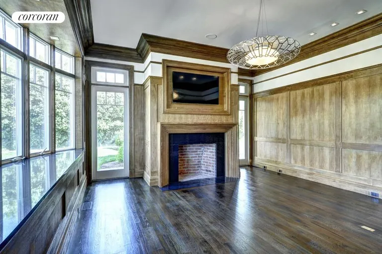 New York City Real Estate | View  | Wood paneled library and screen porch | View 7