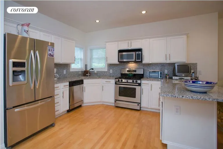 New York City Real Estate | View  | Stainless & Granite Kitchen with View of Pool | View 6
