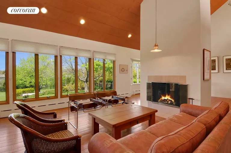 New York City Real Estate | View  | Living Room with Fireplace and wonderful view of the 2 acre property | View 7