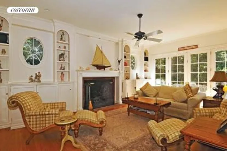 New York City Real Estate | View  | Great room wih fireplace and french doors to the outside | View 4