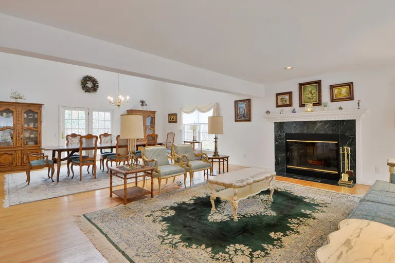 New York City Real Estate | View  | Living room with wood burning fireplace | View 8