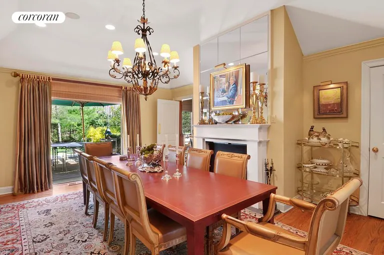 New York City Real Estate | View  | Dining area with fireplace opens to back yard | View 4