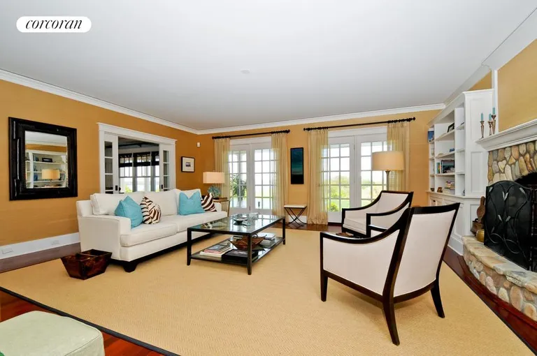 New York City Real Estate | View  | living room with stone fireplace | View 4