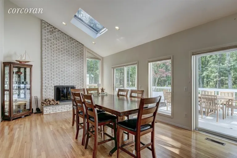 New York City Real Estate | View 17 Crescent Way | dining-family room with fireplace | View 5