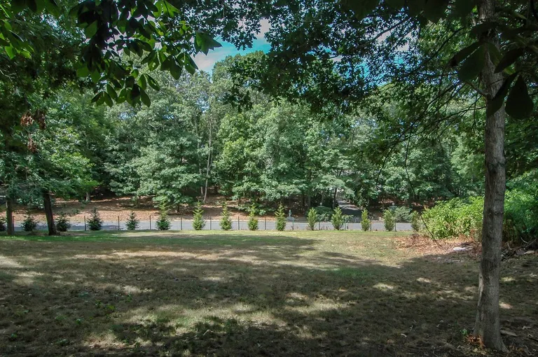 New York City Real Estate | View  | large fenced rear yard room for pool | View 3