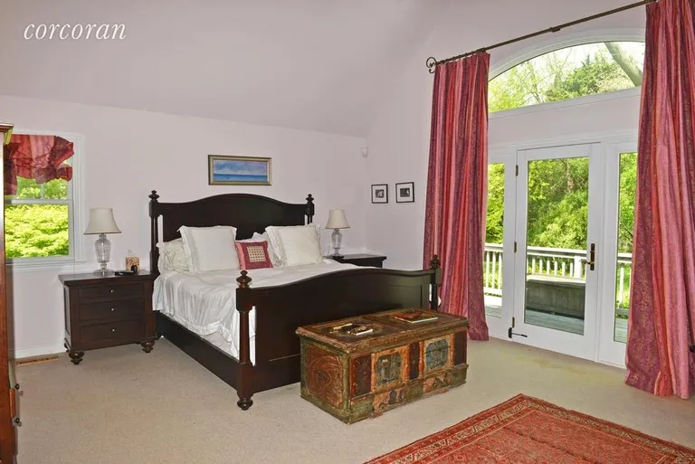 New York City Real Estate | View 2 Fred's Lane | master bedroom suite with doors to deck | View 12