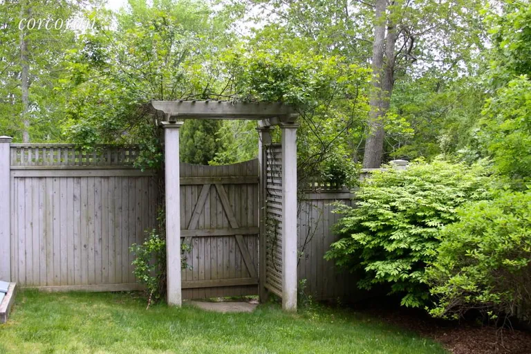 New York City Real Estate | View 2 Fred's Lane | gate to pool area | View 19