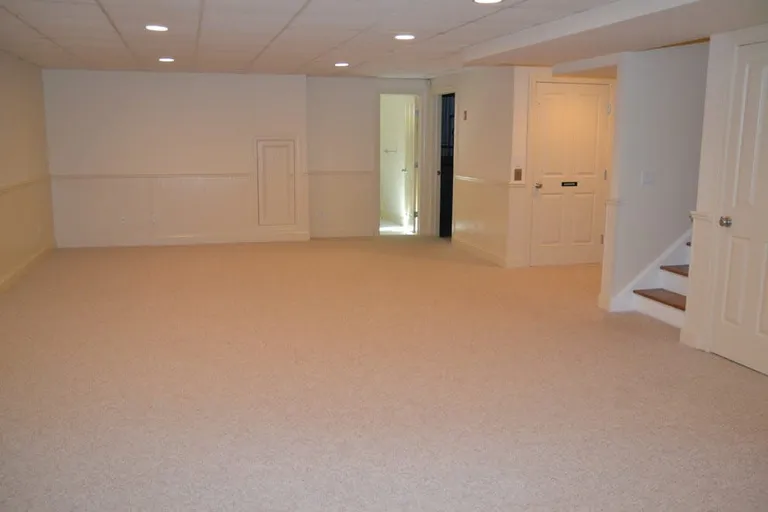 New York City Real Estate | View 19-12 Jessup's Landing | sample basement great room | View 7