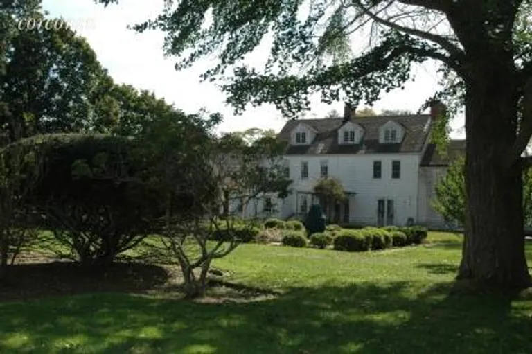 New York City Real Estate | View 116 South Country Road | Main House Back Lawn | View 12