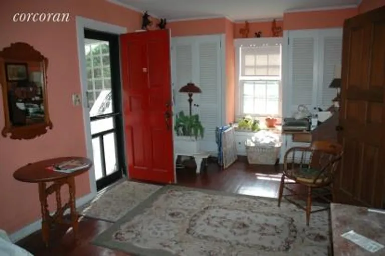 New York City Real Estate | View 116 South Country Road | Carriage House Bedroom Down | View 17