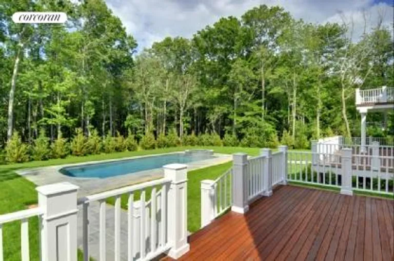 New York City Real Estate | View  | Downstairs master bedroom has deck overlooking pretty back yard | View 12