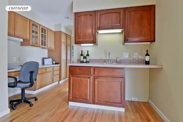 New York City Real Estate | View  | desk space leading to wet bar area of living room | View 3