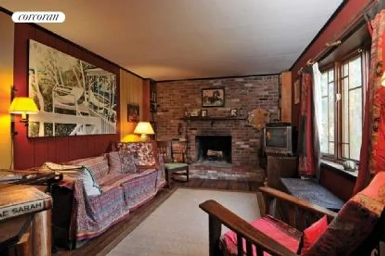 New York City Real Estate | View  | Den with Wood Burning Brick Fireplace | View 7