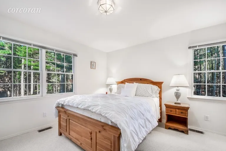 New York City Real Estate | View 57 Bull Path | Upstairs Bedroom 1 with ensuite bath | View 10