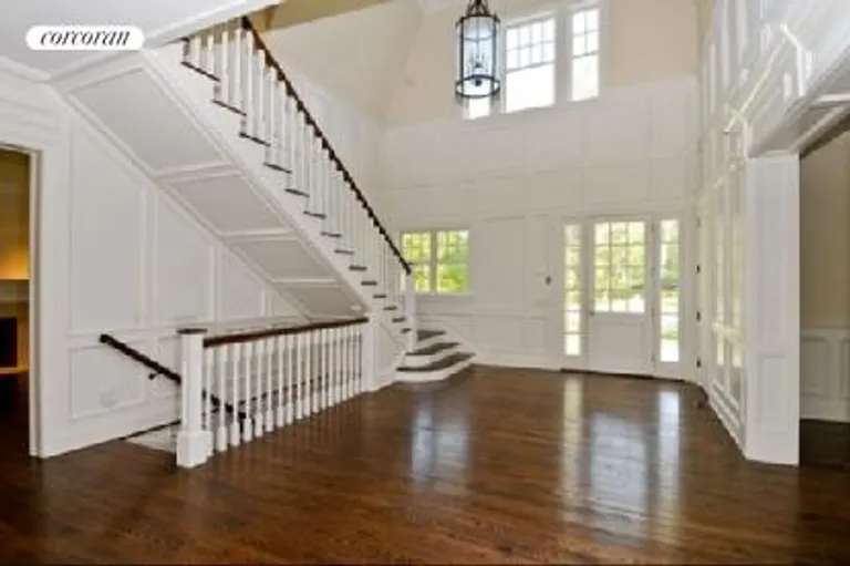 New York City Real Estate | View  | Open Stairway to Large Finished Basement | View 8