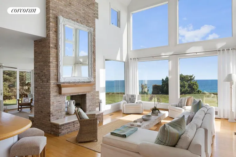 New York City Real Estate | View 390 Old Montauk Highway | fabulous living room w/fireplace | View 4