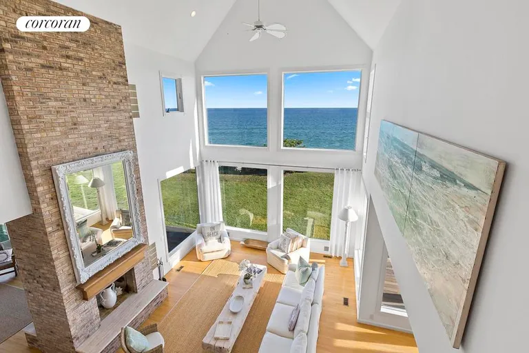 The Hamptons Real Estate | View 390 Old Montauk Highway | window walled living areas | View 5