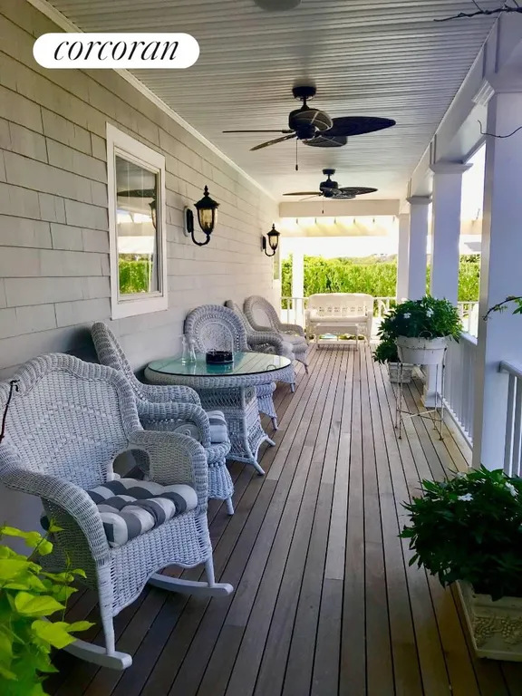 The Hamptons Real Estate | View 390 Old Montauk Highway | covered porch | View 22