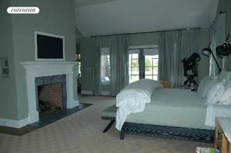 New York City Real Estate | View  | master bedroom with fireplace and private deck | View 10