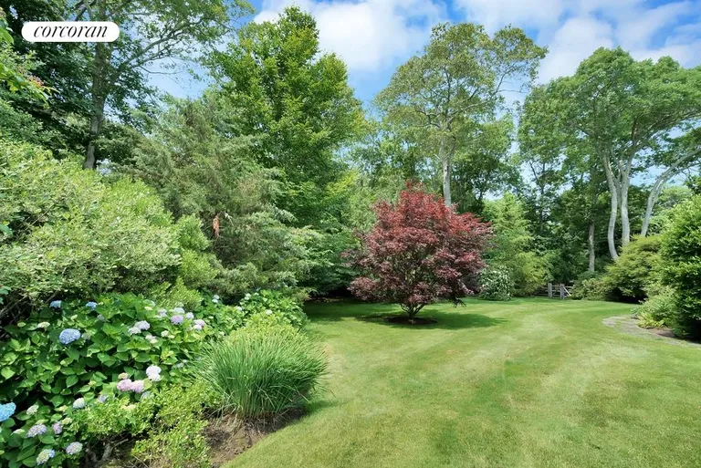 New York City Real Estate | View 104 Old Stone Highway (House & Cottage) | Peace and Quiet amid one of the most spectacular gardens around | View 11