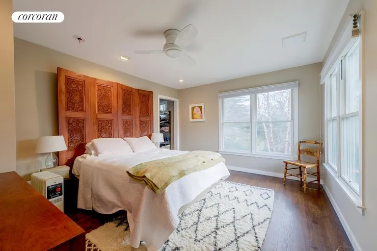 New York City Real Estate | View 104 Old Stone Highway (House & Cottage) | Cottage Master Bedroom on the upper level | View 20