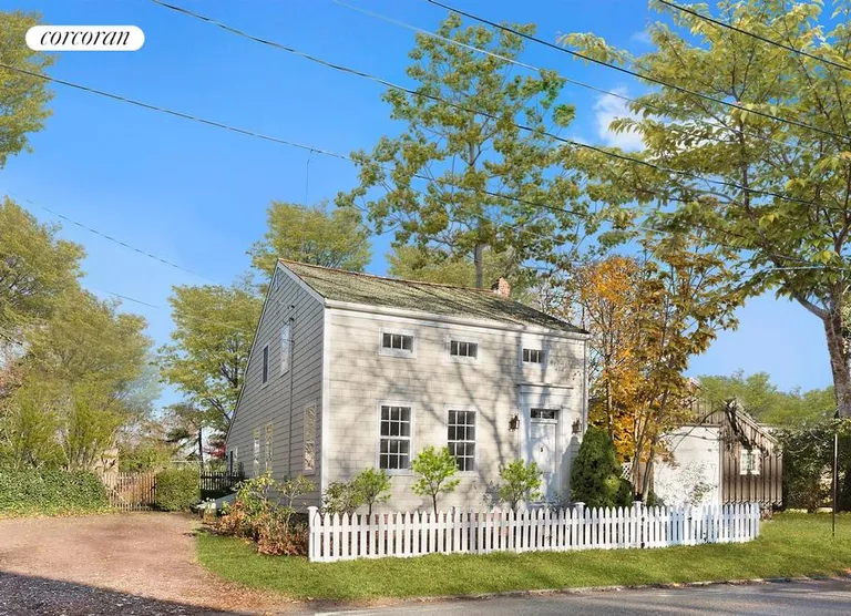 New York City Real Estate | View  | Front of cottage with quintessential fencing | View 2