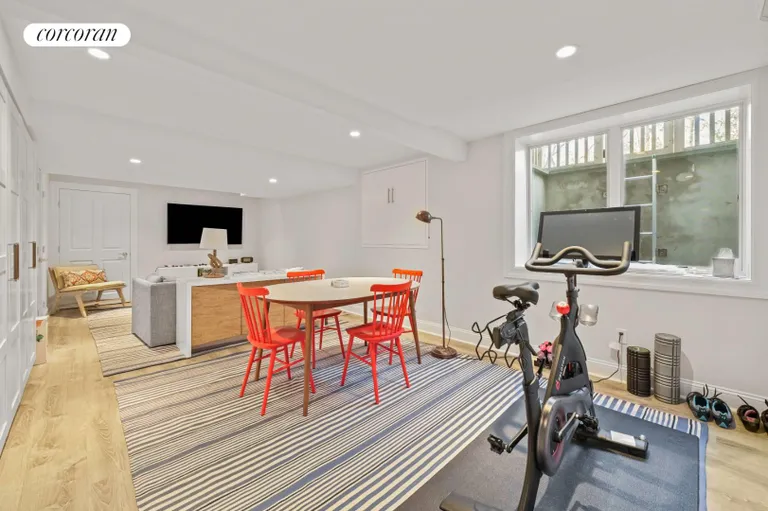 New York City Real Estate | View 26 Briarcroft Drive | finished basement with Peloton Bike | View 24