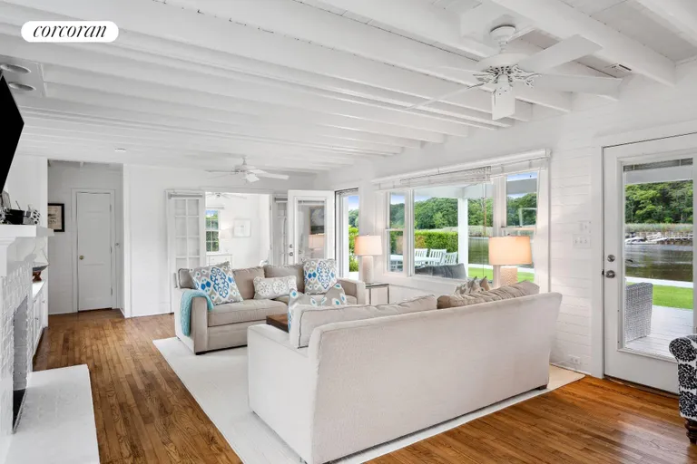 New York City Real Estate | View 19 Bishop Avenue | Waterfront Living Room | View 4