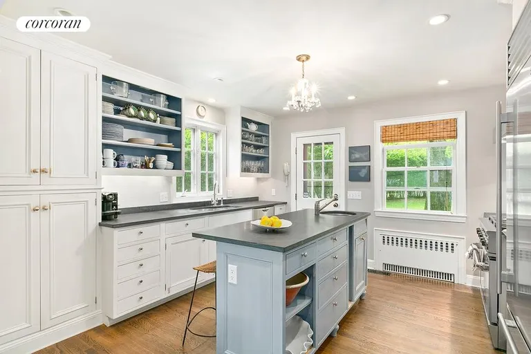 New York City Real Estate | View  | Kitchen has breakfast counter and opens to the back yard | View 4