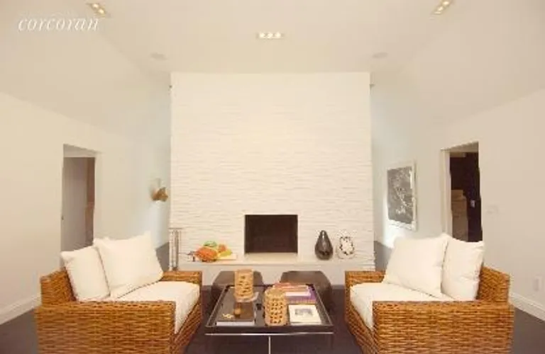 New York City Real Estate | View Wainscott | Sitting Room with Fireplace | View 3