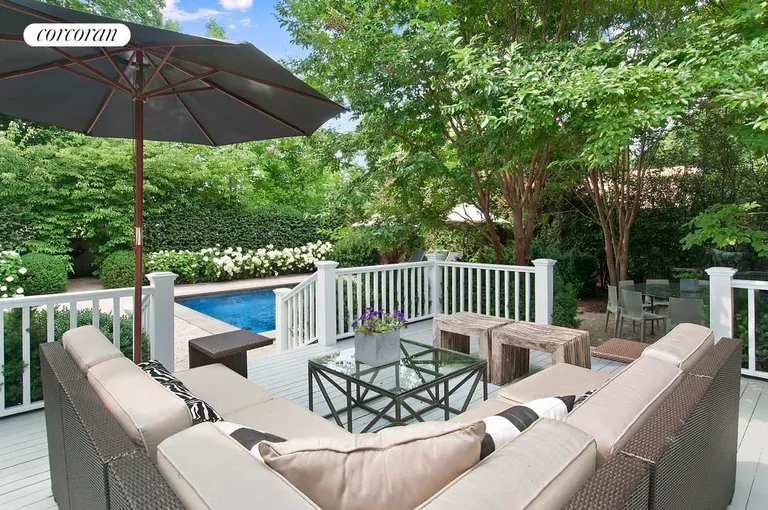 New York City Real Estate | View  | Sunny and secluded deck overlooking pool and grounds | View 9