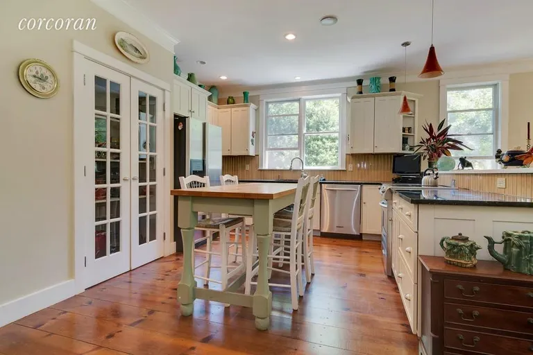 New York City Real Estate | View 160 West Neck Road | Fun in the kitchen with friends | View 4
