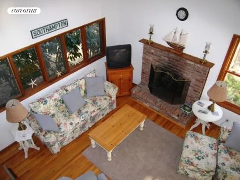 New York City Real Estate | View  | Living Room with Wood Burning Brick Fireplace | View 4