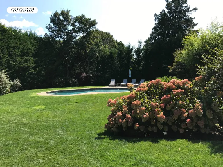 New York City Real Estate | View 70 Miller Lane East | Lushly Landscaped Backyard | View 19