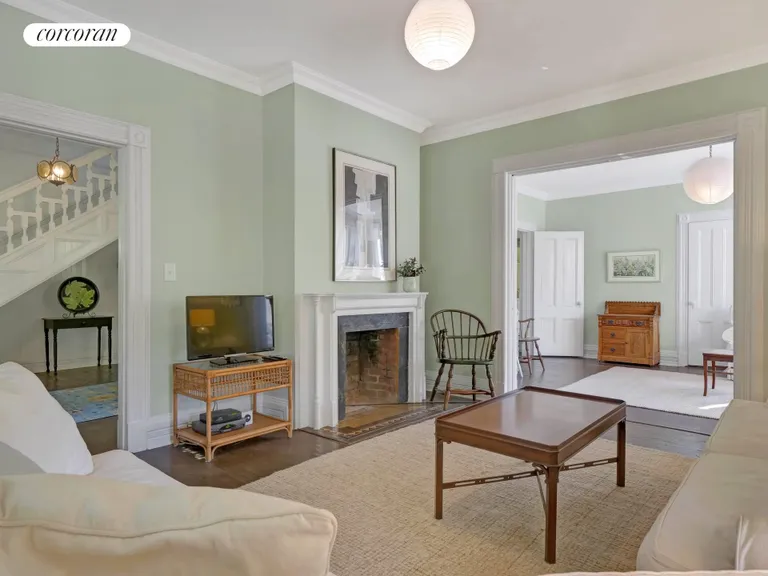 New York City Real Estate | View 51 Quogue Street | Front Parlor with Fireplace | View 4