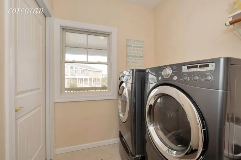 New York City Real Estate | View 812 Dune Road | Laundry Room | View 19
