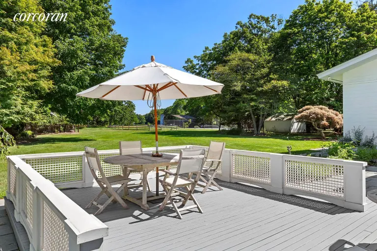 New York City Real Estate | View 132 South Country Road | Back Deck Overlooking Proeprty | View 18