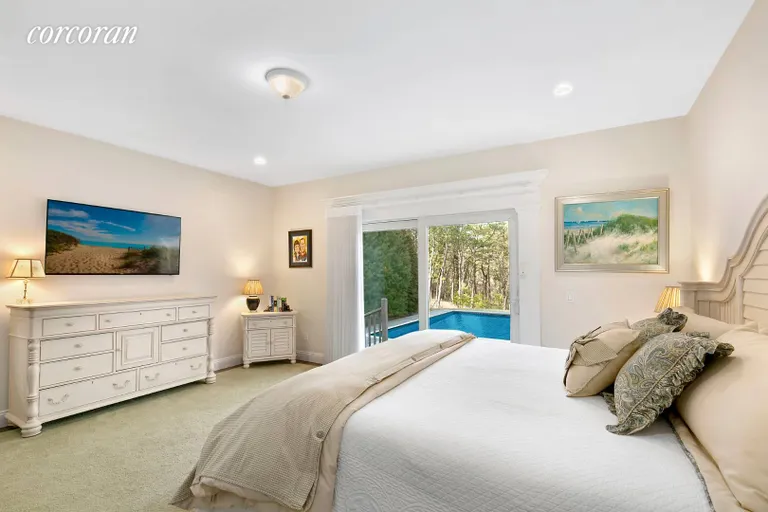 New York City Real Estate | View 22 Adam Lane | Master Suite Overlooking Pool | View 9