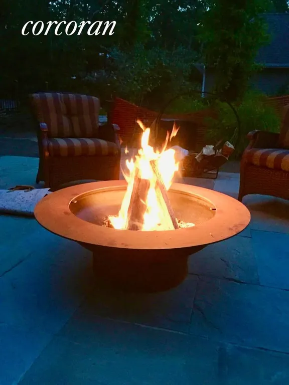 New York City Real Estate | View 52 Old Northwest Road | Firepit at night | View 26