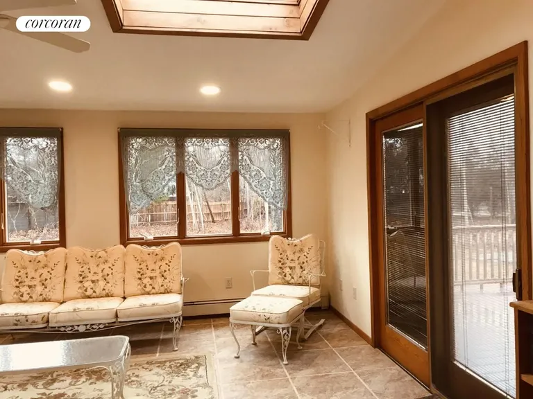 New York City Real Estate | View 6 Crab Creek Road | Sunroom open to Kitchen and deck | View 10