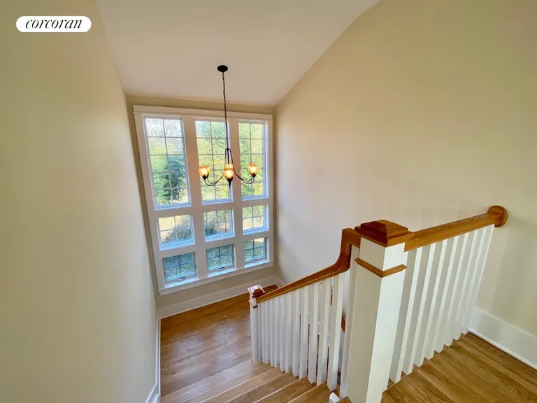 New York City Real Estate | View 32 Tyler Road | Sunlit Stair Entry | View 25