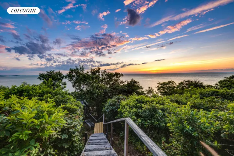 New York City Real Estate | View 1600 Hyatt Road | Stairs to the beach at sunset | View 6