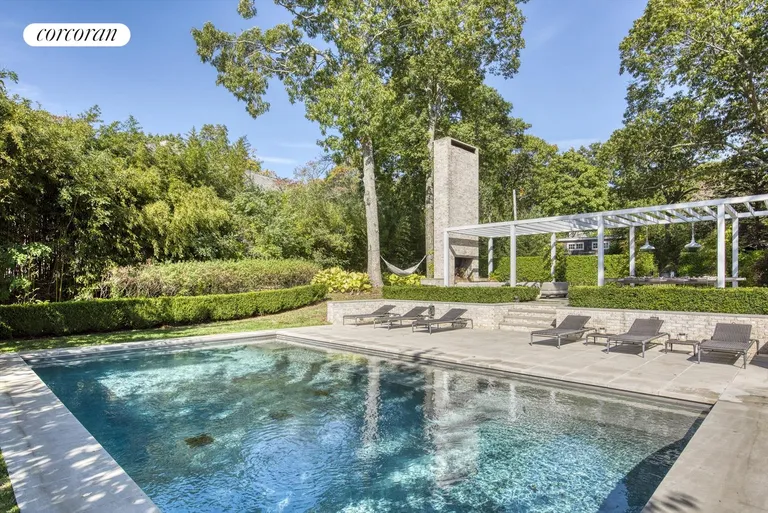 New York City Real Estate | View 59 Tuthill Drive | Limestone Pool Surround | View 22