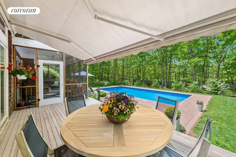 New York City Real Estate | View 21 Cove Neck Lane | Retractable awning | View 20