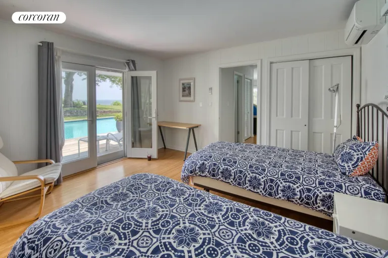 New York City Real Estate | View 183 Ram Island Drive | Pool House Bedroom | View 24
